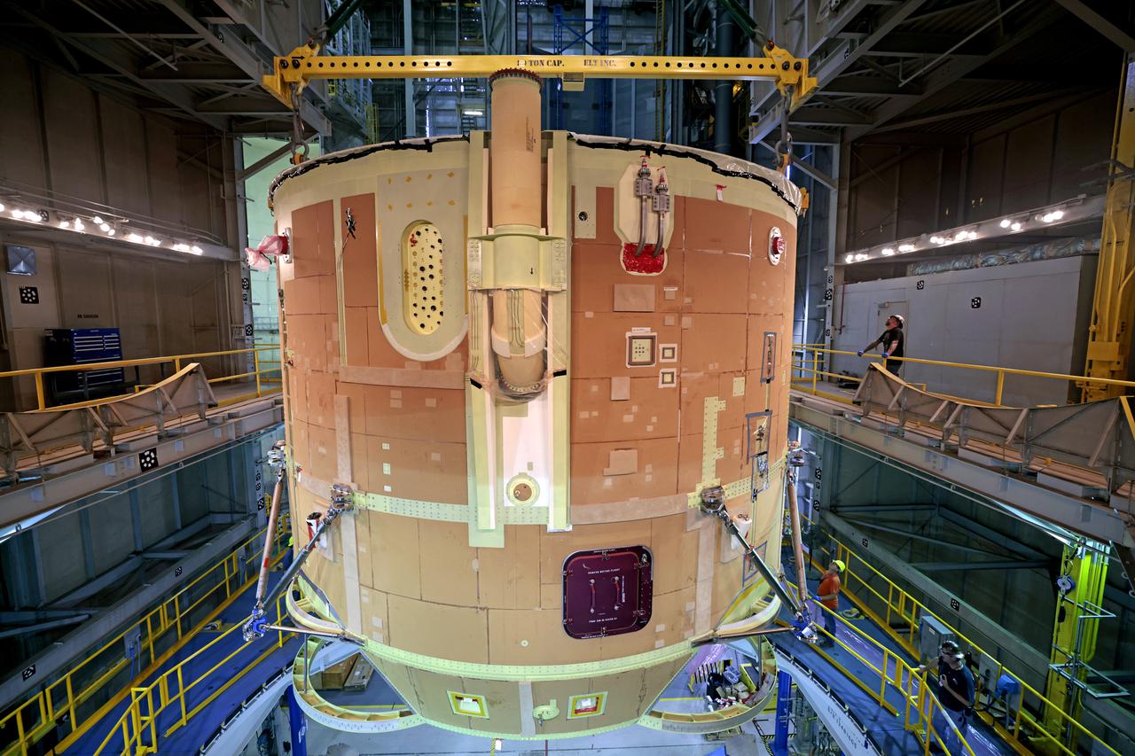 Technicians at NASA’s Michoud Assembly Facility have joined the engine and boat-tail sections of NASA’s Space Launch System rocket for Artemis II in preparation for its next step in production. When complete, the engine section will house the four RS-25 engines and include vital systems for mounting, controlling and delivering fuel from the propellant tanks to the rocket’s engines. The boat-tail is designed to protect the bottom end of the core stage and the RS-25 engines and was joined with the engine section to comprise the lowest portion of the 212-foot-tall core stage. Together with its four RS-25 engines and its twin solid rocket boosters, it will produce 8.8 million pounds of thrust to send NASA’s Orion spacecraft, astronauts, and supplies beyond Earth’s orbit to the Moon and, ultimately, Mars. Offering more payload mass, volume capability, and energy to speed missions through space, the SLS rocket, along with NASA’s Gateway in lunar orbit, the Human Landing System, and Orion spacecraft, is part of NASA’s backbone for deep space exploration and the Artemis lunar program. No other rocket is capable of carrying astronauts in Orion around the Moon in a single mission.